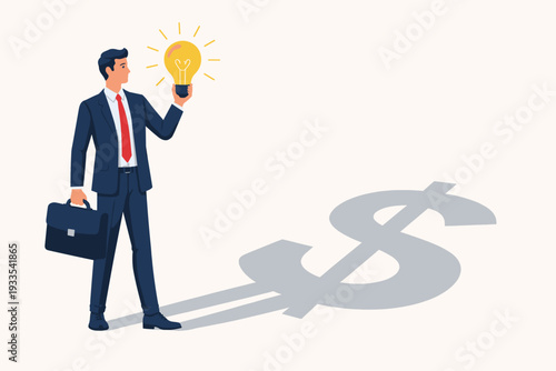 Businessman in a professional suit holding a glowing light bulb representing a creative idea, casting a shadow in the shape of a dollar sign symbol. Concept of monetizing innovation and success.