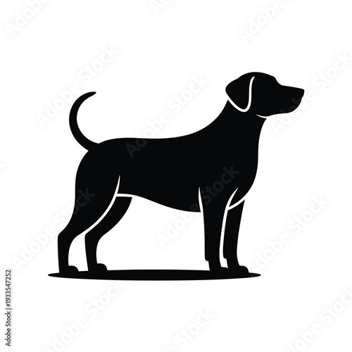 Black silhouette of a standing dog facing towards the right side