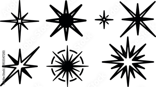 Flat design radial starburst and pointed star icons showing varied burst shapes compass rose motif monochrome vector set bold graphic