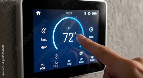 Person Adjusting Temperature on Smart Thermostat.