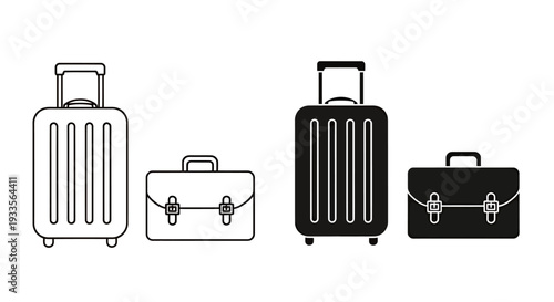 Set of wheeled suitcases and travel accessories in monochrome colors arranged for stylish packing and travel.