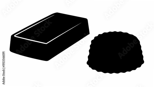 Black soap bar and loofah for skincare routine