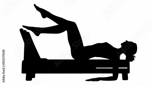 Woman practicing yoga on bed in relaxing pose