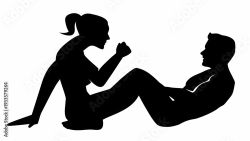 Silhouette of couple doing yoga together in harmony