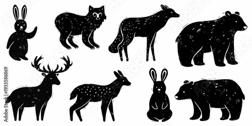 Silhouettes of various forest animals including bears deer and rabbits