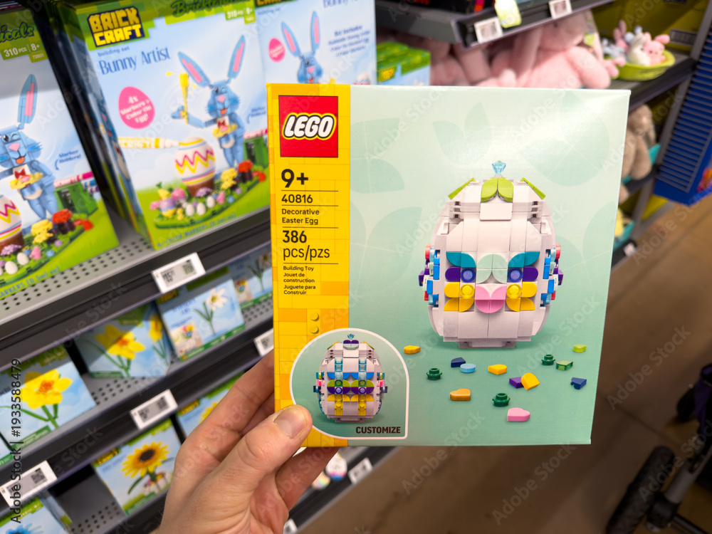 Obraz premium LEGO Easter Basket Building Set Toy Held in Hand in Retail Store Aisle