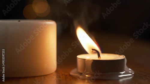 Flickering candle flame: capturing tranquility and warmth in low light ambiance