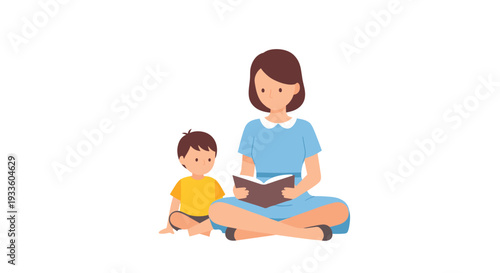 A mother in a light blue dress is sitting cross-legged on the floor, reading an open book to a young boy beside her.