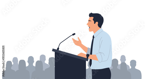A male speaker in a light blue shirt gestures while delivering a speech from a dark grey podium to a silhouetted audience.