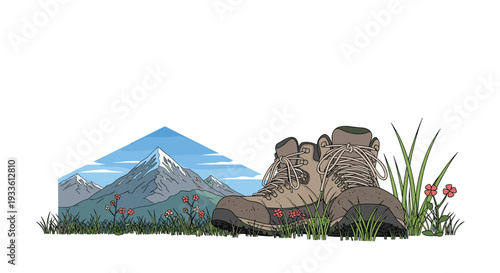 A pair of brown hiking boots with red laces rests on a patch of green grass with small red flowers in front of two snow-capped mountains.