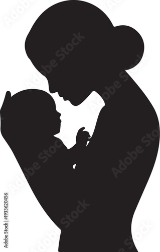 Black silhouette of woman holding and kissing baby