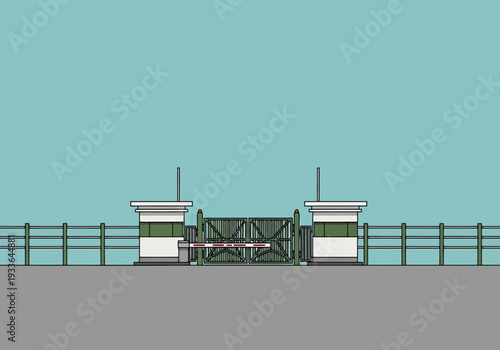 Automated Border Crossing Barrier with Guard Booths and Green Fence Structure Against Clear Blue Sky Backdrop
