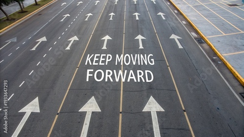 Arrows on road with Keep Moving Forward motivational message