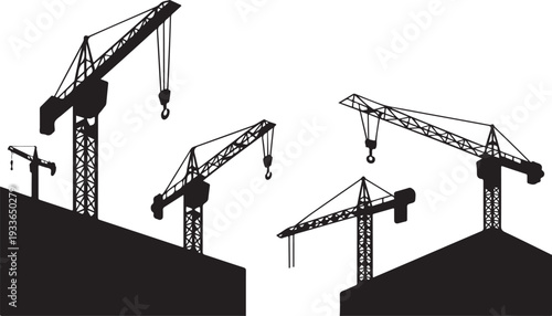 Black silhouette cranes on building rooftops construction cranes