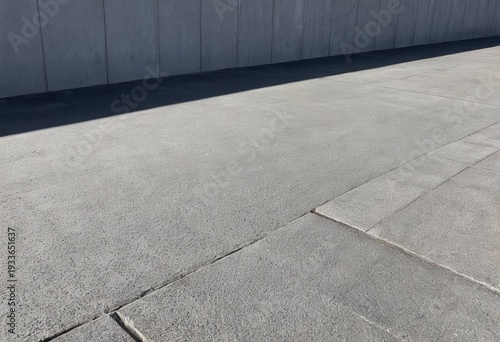 Concrete block exterior wall of modern architecture where light and shadow intersect