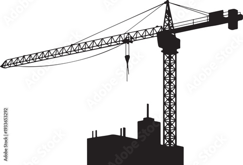 Black silhouette of construction crane and building