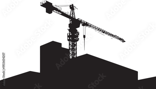 Black silhouette of construction crane on building