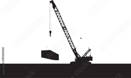 Black silhouette of crane lifting block construction