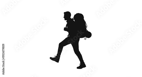 Silhouette of hiker with backpack walking
