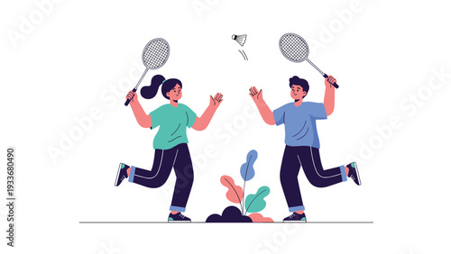 Happy couple enjoys an active afternoon playing badminton together in a park to improve their health and fitness.