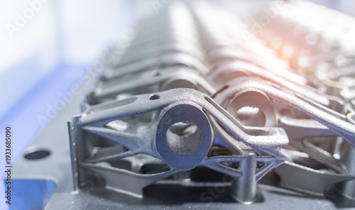 Metal robot hip component products made by metal 3D printing. Modern additive technology.