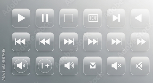 Collection of clear glass media player buttons on a grey background.