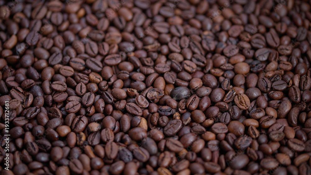 Fototapeta premium Dark roasted beans, Rich aroma and detailed texture of roasted coffee beans, Cozy cafe scene showcasing shiny roasted beans with subtle oil sheen and detailed creases