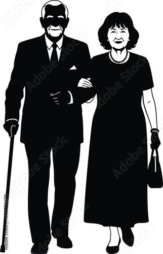 Silhouette of elderly couple walking together