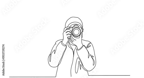 Continuous line drawing of a person holding a camera and taking a photo