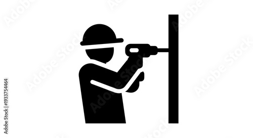 Construction Worker Drilling into Wall.