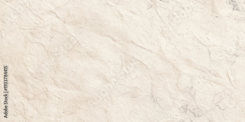 A high-resolution detailed close-up shot of a clean brown paper, creating a soft, neutral, and minimalist aesthetic.