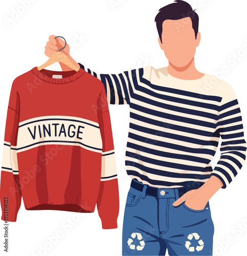 Man poses with vintage clothes, recycling symbol on jeans. Sustainable fashion concept. Suitable for ecofriendly advertisements, blogs, and social media.
