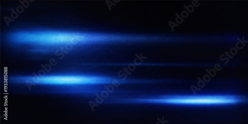 Abstract Blue Light Trails: Dynamic streaks of radiant blue light traverse a black backdrop, producing a sense of motion, speed, and futuristic energy.