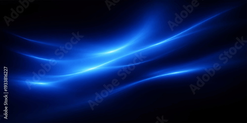 Abstract Blue Light Patterns: a captivating dance of luminous blue light against a dark backdrop, creating an abstract display of energy and movement.