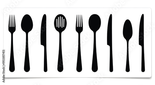A set of black utensils on a white background