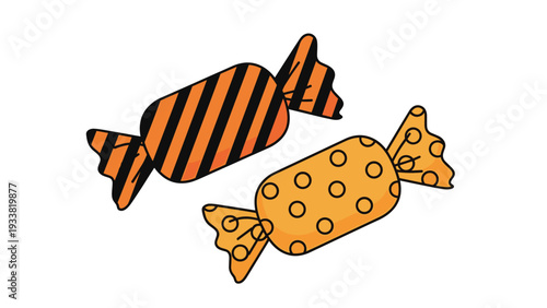 Two pieces of wrapped Halloween candy featuring orange and black patterns including stripes and polka dots on white.