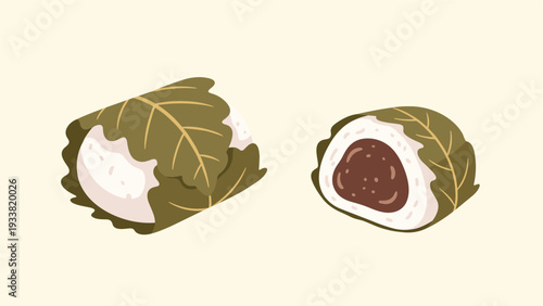 Traditional japanese sakuramochi sweet rice cake filled with red bean paste and wrapped in a preserved green leaf.