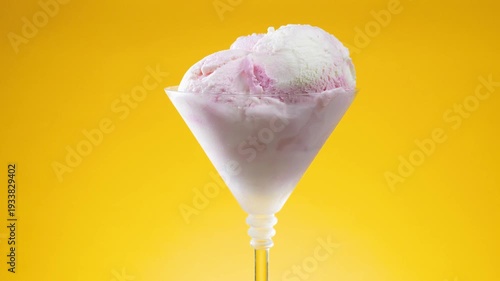 Wallpaper Mural Vanilla ice cream in a glass vase slowly rotates around its axis, against a bright background. Torontodigital.ca