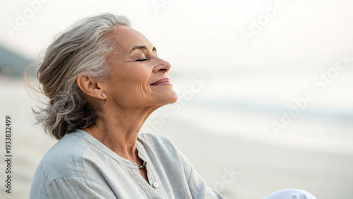 Timelapse of life from girl to elderly woman concept. A serene older woman enjoying the calm beach atmosphere.