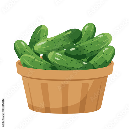 Freshly harvested cucumbers piled in a rustic basket against a clean background