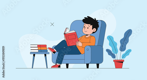 Studious young boy sitting comfortably in a blue armchair and reading an interesting red book in a peaceful home setting.