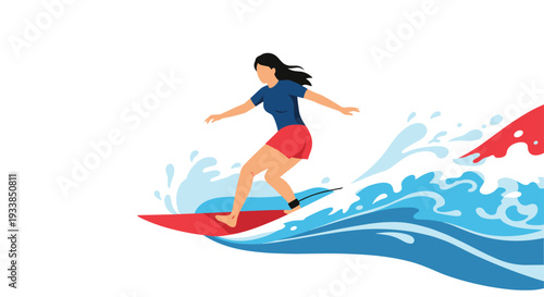 Athletic woman in a blue top and red shorts balances on a surfboard as she rides a large blue ocean wave with white sea foam.