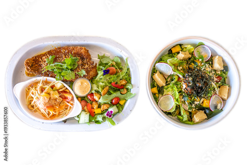 Top view of Vegetable salad fried sea bass and papaya salad, focus selective