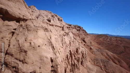 Dynamic FPV Drone View of Alien-Like Red Terrain