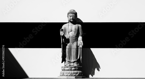 Zen Buddha Statue Against Striking Black and White Background