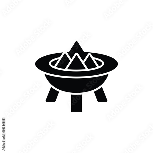 A simple black silhouette of a fire pit with burning embers