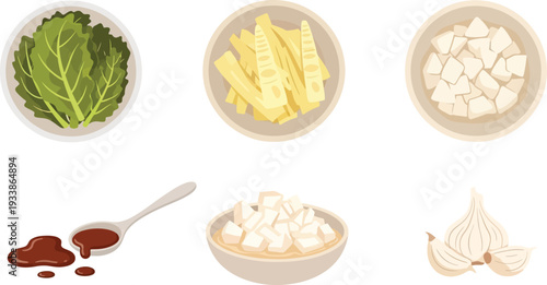 Asian ingredients including bok choy bamboo shoots tofu and garlic bulbs with dipping sauce