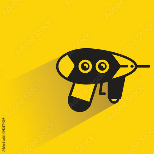 space laser gun icon with shadow yellow background