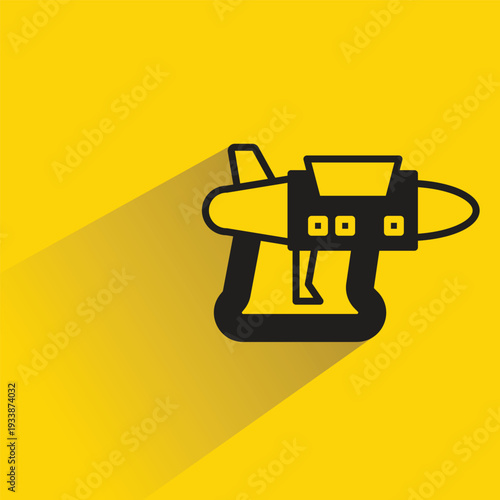 space gun blaster icon with shadow yellow background