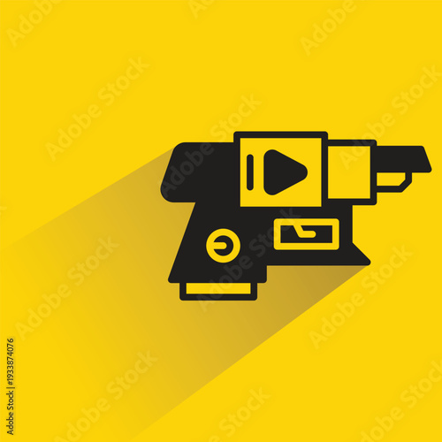 space gun blaster icon with shadow yellow background